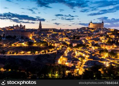 Toledo Cityscape with Alcazar at dusk in Madrid Spain