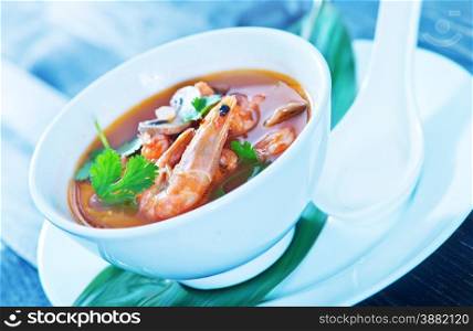 tom yam soup in the white bowl