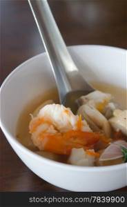 Tom Yum Goong , Thai spicy soup with seafood , shrimp and vegetable