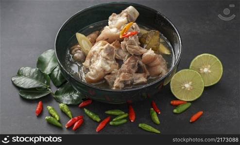 Tom Yum Kha Moo, spicy pork leg soup, hot and sour kaki pork knuckle soup