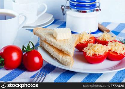 Tomato and cheese with toasts and tea