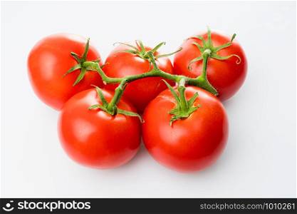 Tomato branch. Tomatoes isolated on white
