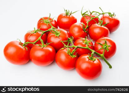 Tomato branch. Tomatoes isolated on white