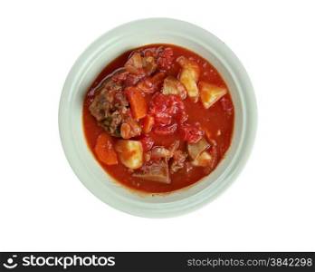Tomato bredie - South African stew, nclude cinnamon, cardamom, ginger and cloves as well as chilli