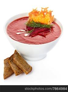 Tomato cream soup with parmesan crisps isolated