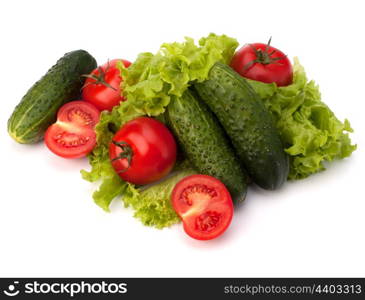 Tomato, cucumber vegetable and lettuce salad isolated on white background