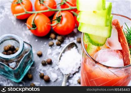 Tomato juice and fresh tomatoes. Glass of fresh tomato juice and fresh tomatoes