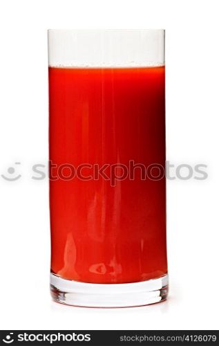 Tomato juice in clear glass isolated on white background