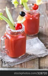 Tomato juice in the mason jars