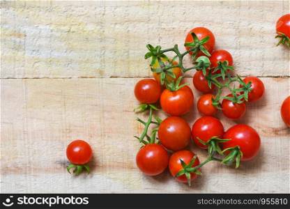 Tomato organic / Ripe red tomatoes on wooden background