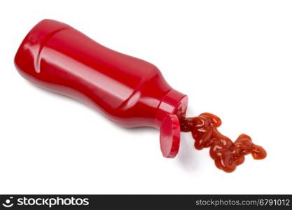 Tomato puree squeezed from a bottle, isolated on white.with clipping path