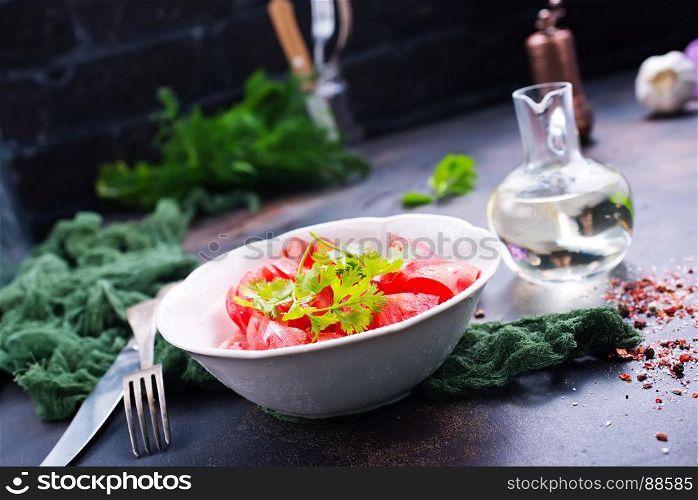 tomato salad with kinza in the bowl