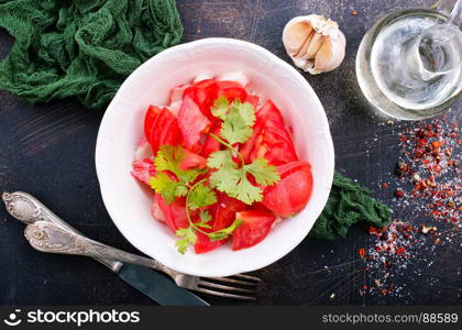 tomato salad with kinza in the bowl