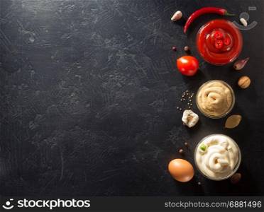 tomato sauce, mayonnaise and mustard in bowl on table