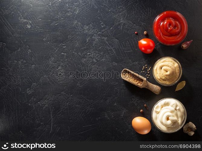 tomato sauce, mayonnaise and mustard in bowl on table