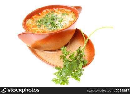Tomato soup parsley isolated against a white background