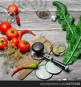 Tomato,spices and cooking utensils for pickling vegetables