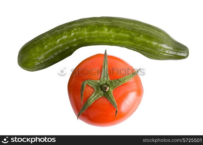 Tomatoes and cucumbers on a white background as phone