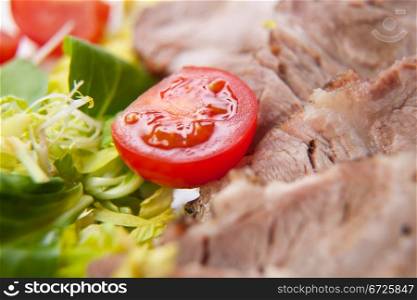 Tomatoes and sliced meat