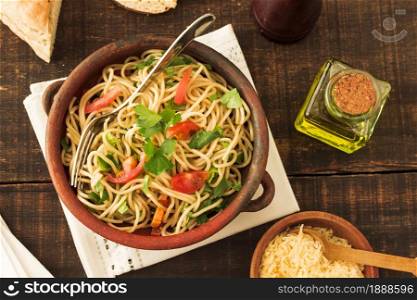 tomatoes coriander toppings spaghetti pasta earthenware. Resolution and high quality beautiful photo. tomatoes coriander toppings spaghetti pasta earthenware. High quality and resolution beautiful photo concept
