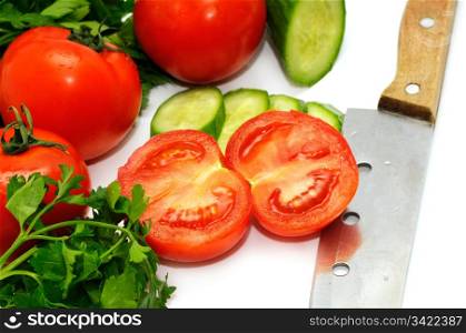 Tomatoes, cucumber and parsley isolated on a white background