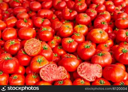 Tomatoes from Mediterranean stacked in marketplace
