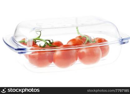 tomatoes in a glass isolated on white