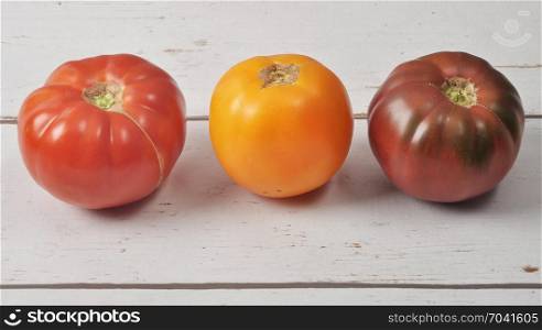 Tomatoes on weathered wood