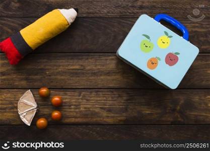 tomatoes processed cheese near lunchbox pencil case