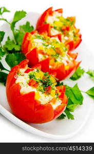 Tomatoes stuffed with russian salad