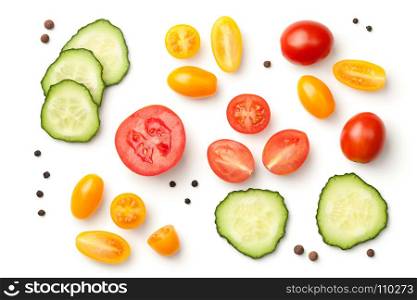 Tomatoes with cucumber isolated on white background. Top view