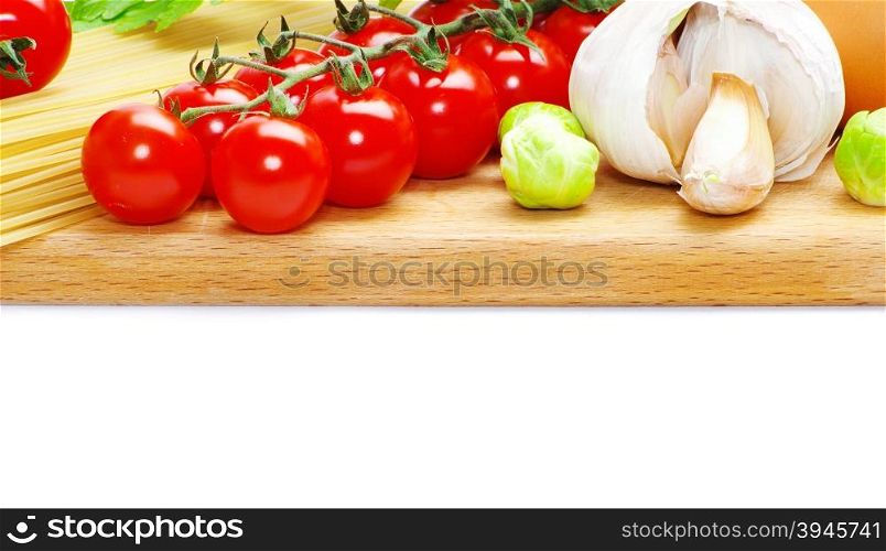 tomatoes with green leaves isolated on white background
