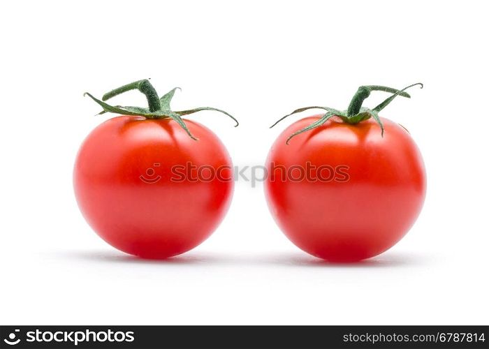 tomatoes with green leaves isolated on white background&#xA;&#xA;