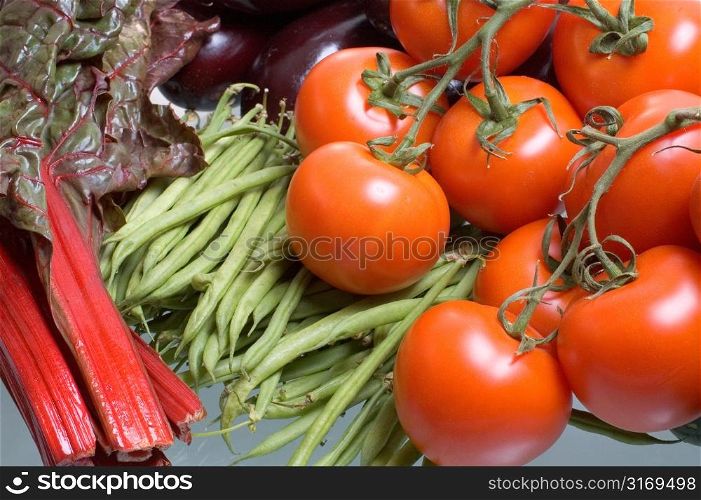 Tomatoes With String Beans And Red Lettuce