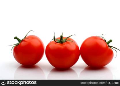 tomatos isolated on white background close up