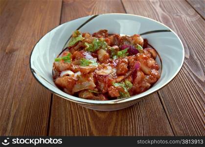 Tomatsild - Norwegian dish of pickled herring, onion and tomato paste