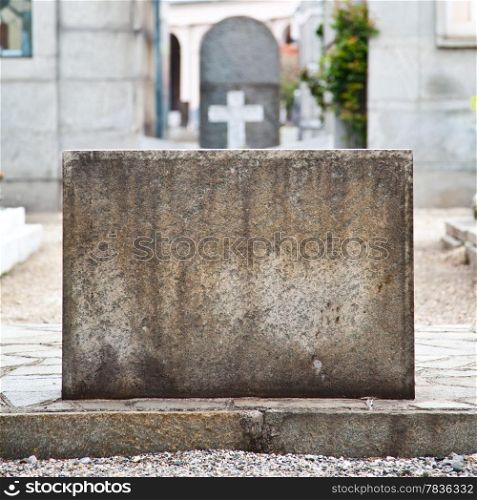 Tombstone in Italian cemetery with copy space