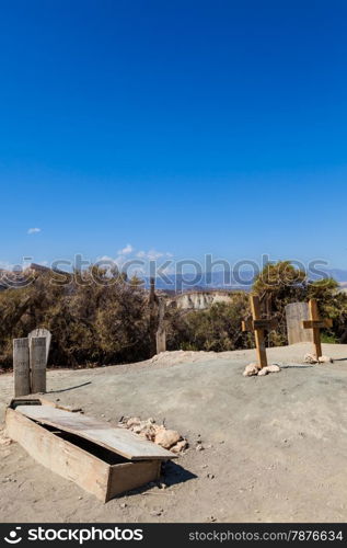 Tombstone made of wood in this old abandoned cemetery