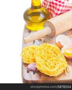 Tonarelli raw pasta. Tonarelli raw pasta with olive oil isolated on white background