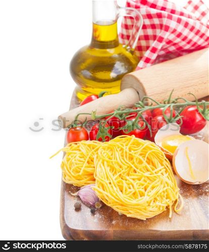 Tonarelli raw pasta. Tonarelli raw pasta with tomato and olive oil isolated on white background