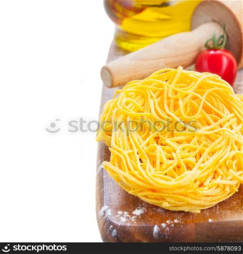 Tonarelli raw pasta with tomato isolated on white background. Tonarelli raw pasta
