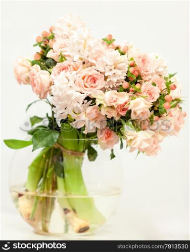 Toned photo of beautiful fresh pink flowers in glass vase