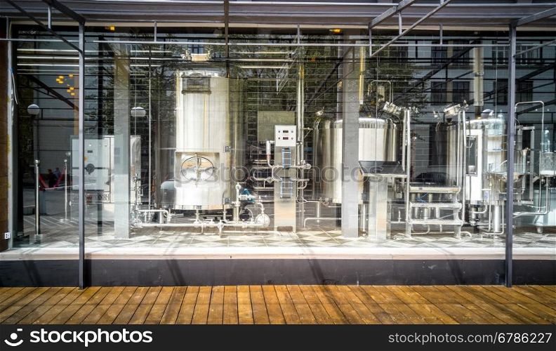 Toned photo of equipment for making beer in small brewery