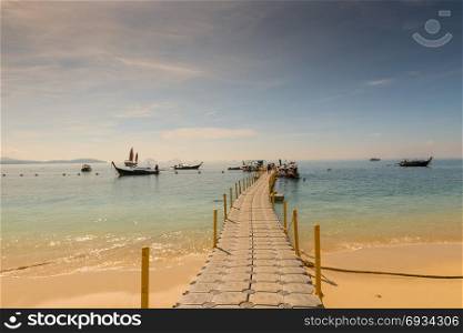 toned picture - view of the pontone with boats in Thailand on the island of Hong