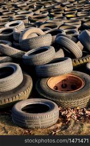 tons of old used tyres in a mix