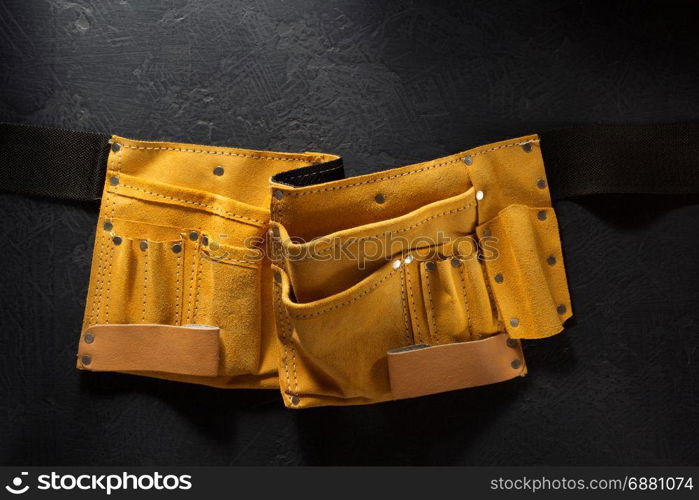 tool belt on black background