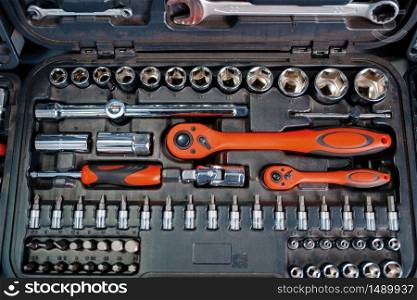 Toolbox with ratchet heads in tool store closeup, nobody. Choice of equipment in hardware shop, professional instrument in supermarket, wrenches and screwdrivers kit. Toolbox with ratchet heads in tool store closeup