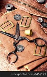 Tools for leather craft. Working tools and cut out pieces of leather