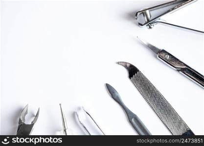 Tools for manicure and nail care on a white background.. Tools for manicure and nail care on white background.