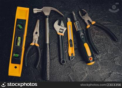 Tools for master builder on a black background